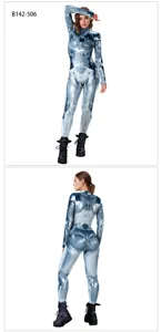 Detailed view of the metallic print long sleeve jumpsuit showing back and front fabric texture.