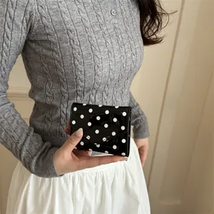 Black patent leather polka dot wallet clutch chic minimalist design for women daily commute