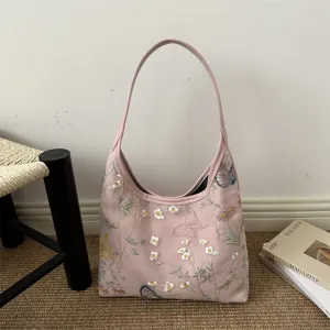 Bolso de hombro bordado en rosa con delicados patrones de flores mariposas elegante bolso medialuna