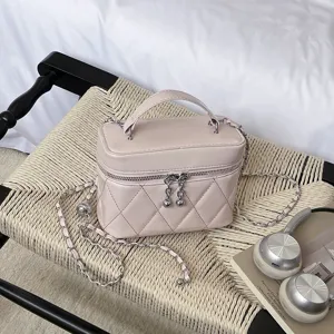Sac bandouliere matelasse rose avec chaine pour femme, sac a main epaule en cuir elegant.