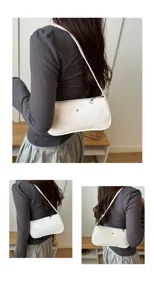 Sac epaule baguette en cuir crocodile blanc pour femme, tendance chic mode ete decontracte.