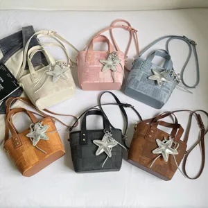 Fashion casual shoulder crossbody bucket bag with star pendant, stylish daily handbag for women.