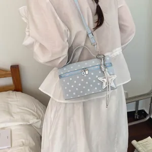 Light blue polka dot vanity shoulder crossbody bag with star charm and top handle for women