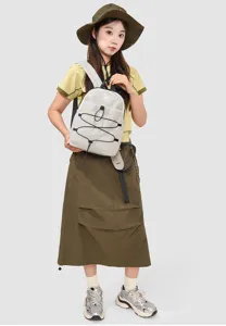 Lightweight casual mini backpack for women, stylish outdoor travel daypack with secure cord.