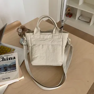 Casual canvas bucket tas voor vrouwen, stijlvolle schoudertas met handig handvat bovenop.