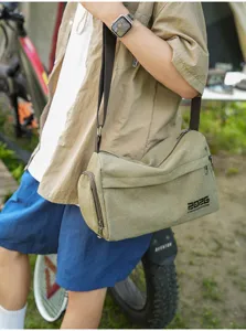 Borsa a tracolla casual in tela da uomo, grande capacità per lavoro e viaggi quotidiani.