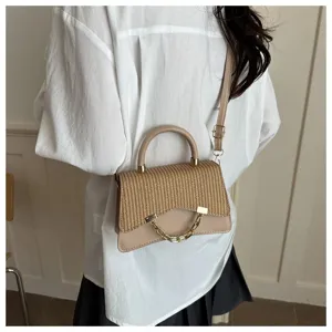 Chic straw woven crossbody bag for women, stylish summer shoulder handbag with metal chain.