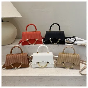 Stylish minimalist solid color women shoulder crossbody handbag with chain detail.