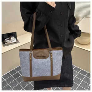 Stylish casual women canvas shoulder tote bag with contrast leather and cute bow decoration.