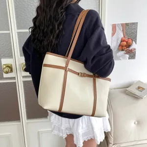 Retro texture large capacity shoulder tote bag detail view with stylish brown leather trim.