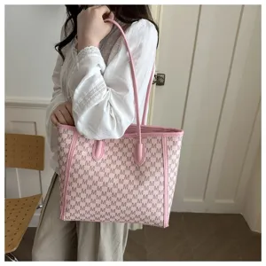 Casual chic summer 2026 tote bag with stylish monogram print, perfect commuter shoulder bag.