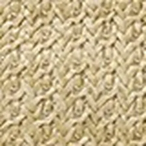 Close up detail of summer straw woven bag texture, showing intricate crochet pattern.