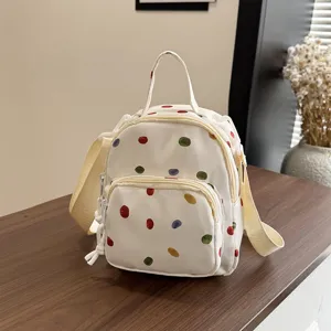 Zaino mini in tela da donna con pois colorati borsa a tracolla casual molto elegante