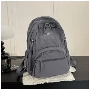 Stylish casual grey nylon backpack for women with multiple zipped pockets and large capacity