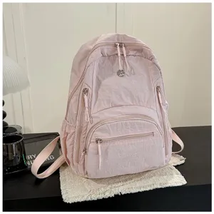 Minimalist solid color women backpack, large capacity school bag, daily casual style detail view.