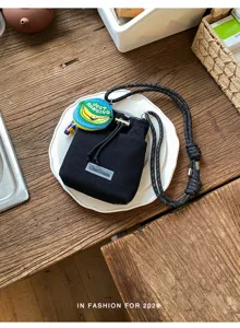 Zwarte nettas met verstelbare schouderriem en schattige bananenhanger voor dagelijks gebruik