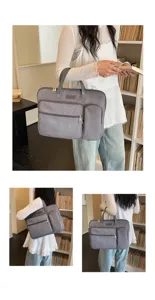 Borsa per laptop da lavoro grigia con scomparti multipli per l'uso quotidiano.