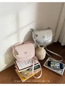 Versatile vintage women shoulder bag stylish mini saddle crossbody bag for daily fashion.