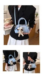 Bolso de almohada casual de estilo coreano con dije de perrito, bolso de mano elegante.