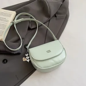 Minimalist mint green crossbody bag, stylish women's mini shoulder bag for casual daily wear.