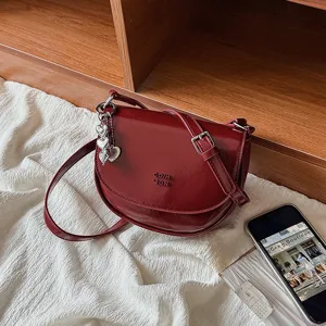 Women Small Saddle Bag PU Leather Vintage Crossbody Bag Ins Style Shoulder Bag With Metal Pendant Minimalist Handbag