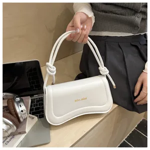 Minimalist white underarm shoulder bag with knotted straps and chic curved design for daily wear.