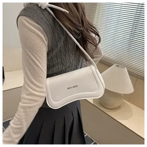 Chic minimalist white underarm shoulder bag for women, stylish everyday PU leather purse.