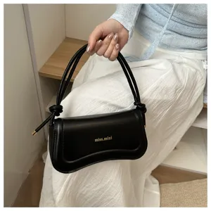 Elegant black leather underarm shoulder bag for women, trendy minimalist design, spring summer new.