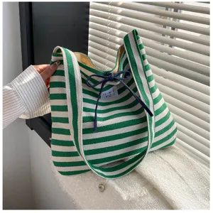 Green and white striped canvas tote bag, casual large capacity shoulder bag for daily commuting.