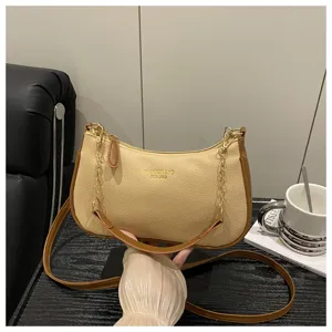 Chic women's crossbody shoulder bag with stylish contrast color, metal chain and PU leather.