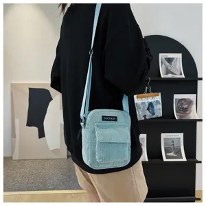 Fashion corduroy crossbody bag for women, casual light blue single shoulder small square bag.