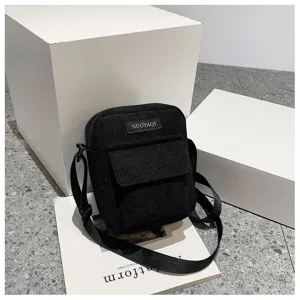 Black corduroy crossbody bag, minimalist korean style casual shoulder bag with front pocket.