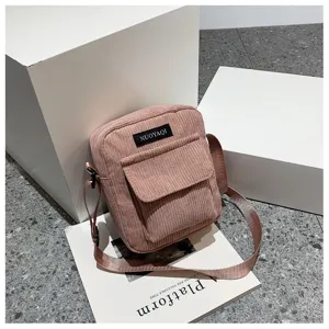 Pink corduroy crossbody bag for women, trendy small square shoulder bag with front pocket.
