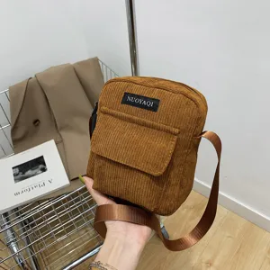 Brown corduroy crossbody shoulder bag for women, stylish casual small square bag main view.