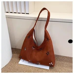Brown suede shoulder tote bag for women, large capacity casual commuting bag with floral cutouts.