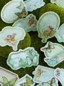 Vintage butterfly fairy decorative stickers, green label stationery pack for DIY journaling.