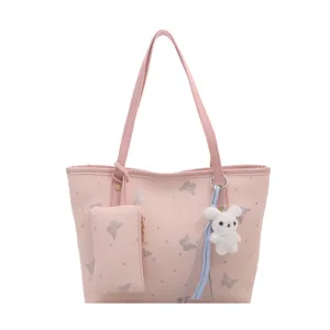 Pink tote bag for women stylish summer shoulder bag with cute rabbit charm and glitter butterfly design.
