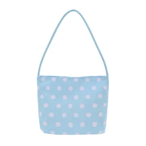 Blue polka dot nylon shoulder bag for women, casual underarm handbag for daily commute.