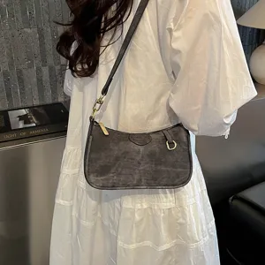 Dark grey retro hobo shoulder crossbody bag featuring gold tone hardware details.