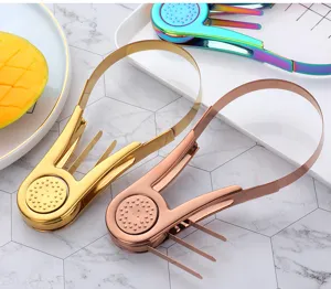 Trancheur de mangue en acier inoxydable et outil de coupe de fruits, gadget de cuisine pratique.