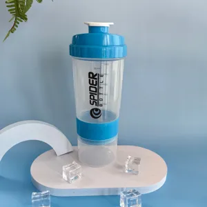 Detailed view of the clear 3-layer protein shaker bottle with blue lid and storage compartment.