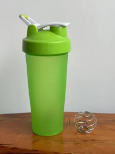 Green protein shaker bottle fitness cup detail view for gym workout and daily shakes