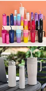 Detailed view of colorful large capacity plastic sports water bottles with straw and dual drinking.