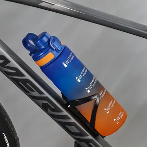 Gradient blue orange sports water bottle mounted on bicycle frame with time markings
