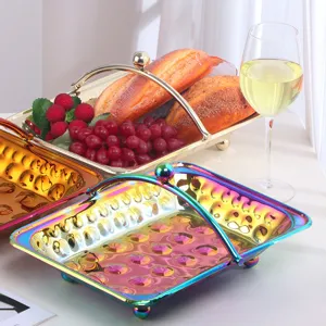 Roestvrijstalen fruitmand met handvat, gehamerd ontwerp moderne serveertablet voor thuis.