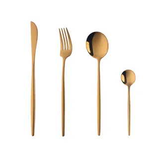 Stainless steel rose gold cutlery set, 4-piece flatware including knife, fork and spoons.