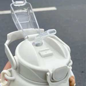 Detailed view of cute cartoon bear straw water bottle lid, portable large capacity sports cup.