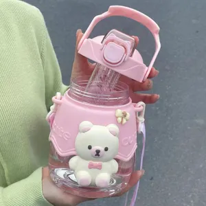 Pink cartoon bear water bottle detail view, showcasing cute 3D animal design and portable strap.