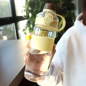 Portable large capacity plastic water bottle with straw and handle for daily sports.
