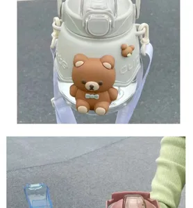 Cute 3D brown bear large capacity water bottle with straw, strap, and heat-resistant design.